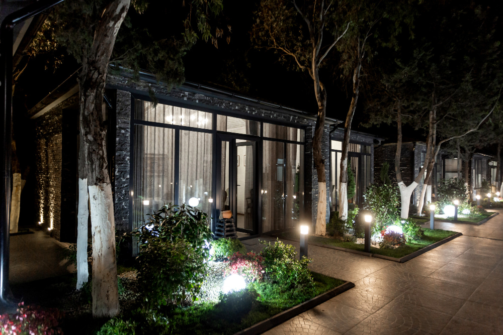 Electrician installing modern garden lighting system in Elizabeth Bay