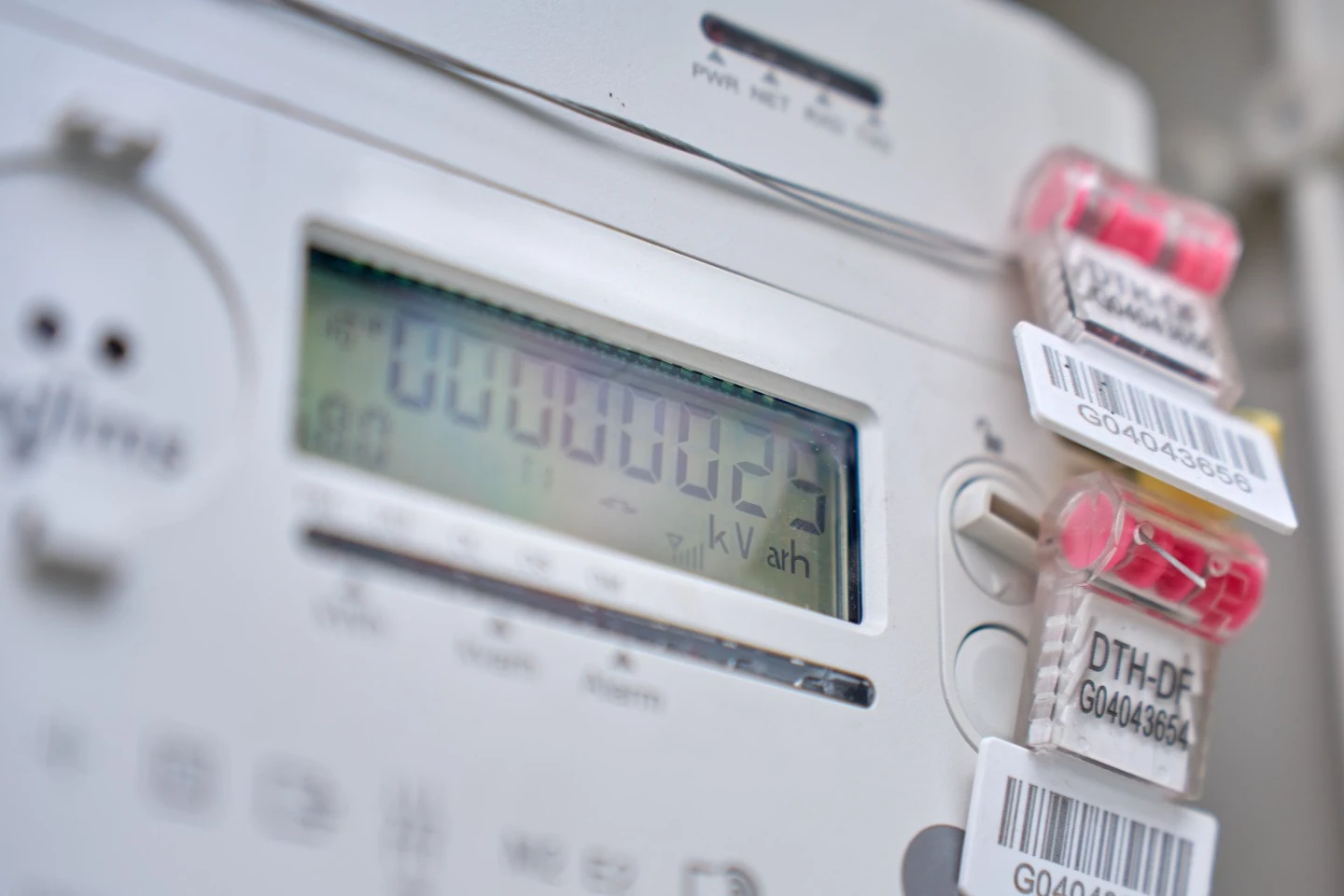 A modern digital three-phase smart meter installed by an ASP Level 2 electrician for solar energy tracking.