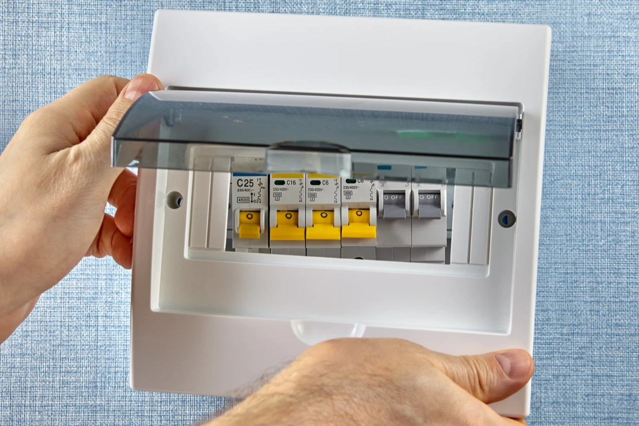 A clean, modern Australian electrical switchboard featuring combined RCBO switches for maximum safety.